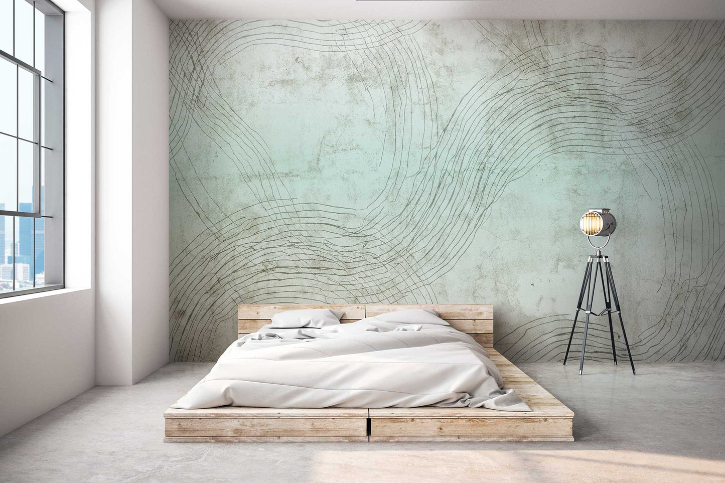 Schlafzimmer mit niedrigem Holzrahmenbett, weißer Bettdecke, großem Fenster und Stehlampe auf Dreibein-Stativ vor Wand mit abstrakten Linienmustern Tapete von Superwalls