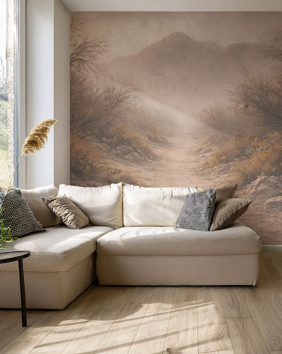 Beige Ecksofa mit Kissen vor einer Wand mit einer Landschaftstapete von Superwalls und hellem Holzboden